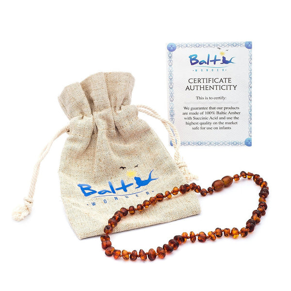 Baltic Amber Teething Necklace For Babies (Unisex) (Cognac) - Anti Flammatory, Drooling & Teething Pain Reduce Properties - Natural Certificated Oval Baltic Jewelry with the Highest Quality Guaranteed.